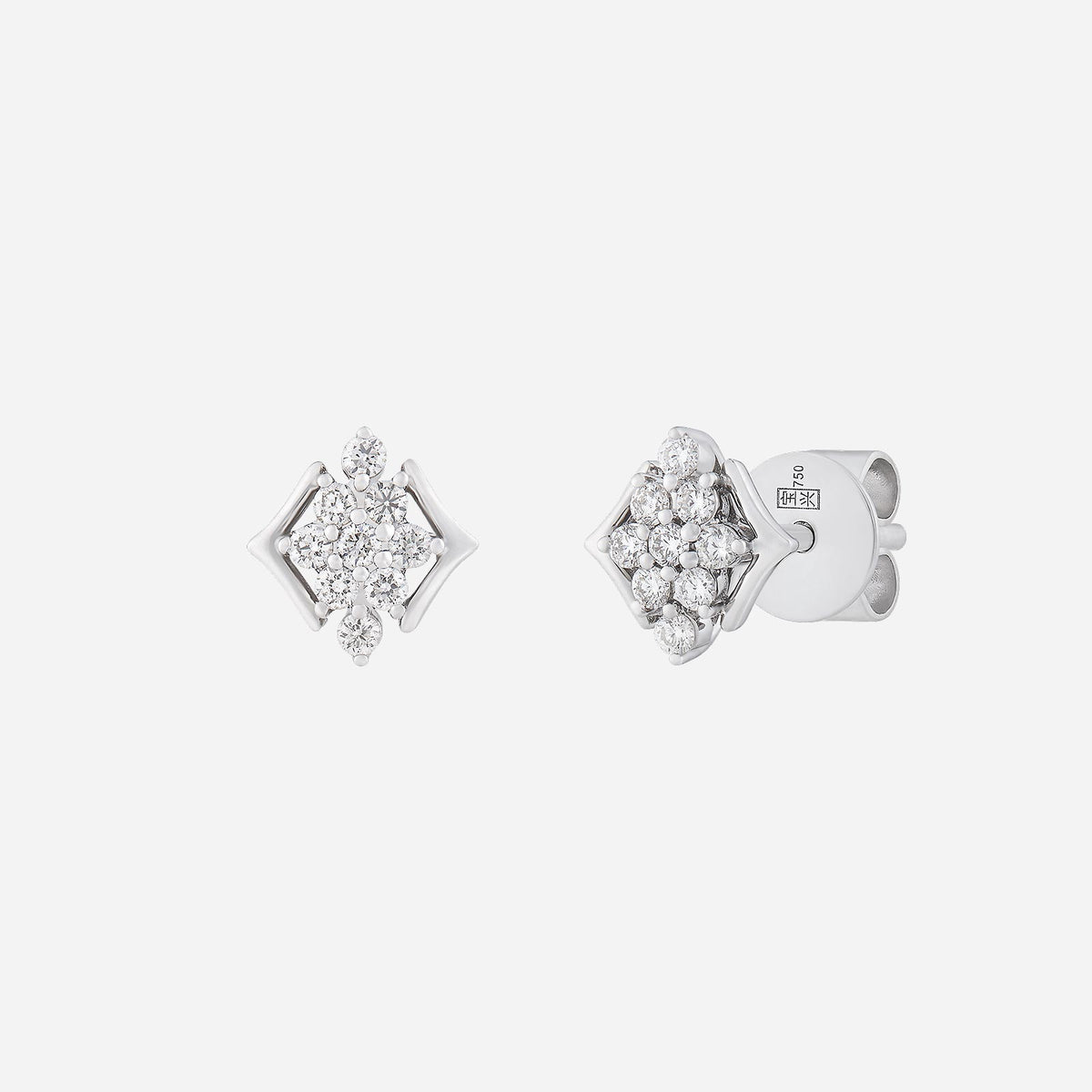 sparkling rhombus diamond earrings in 18k white gold with clustered diamonds in a sculpted design.