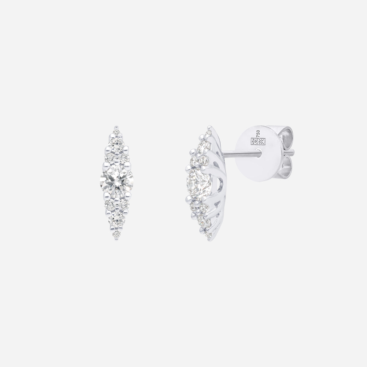 luminous rhombus earrings in 18k white gold featuring a central round diamond and graduated pavé accents.