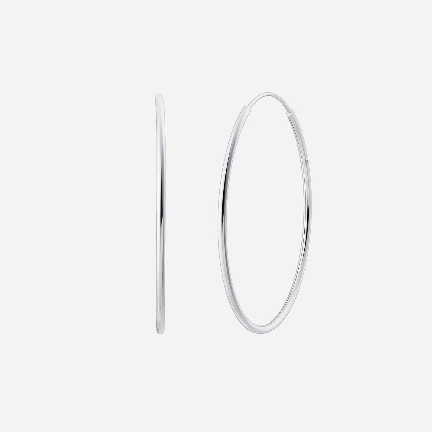 18k white gold hoop earrings with a sleek, polished design, showcasing timeless elegance and versatility.