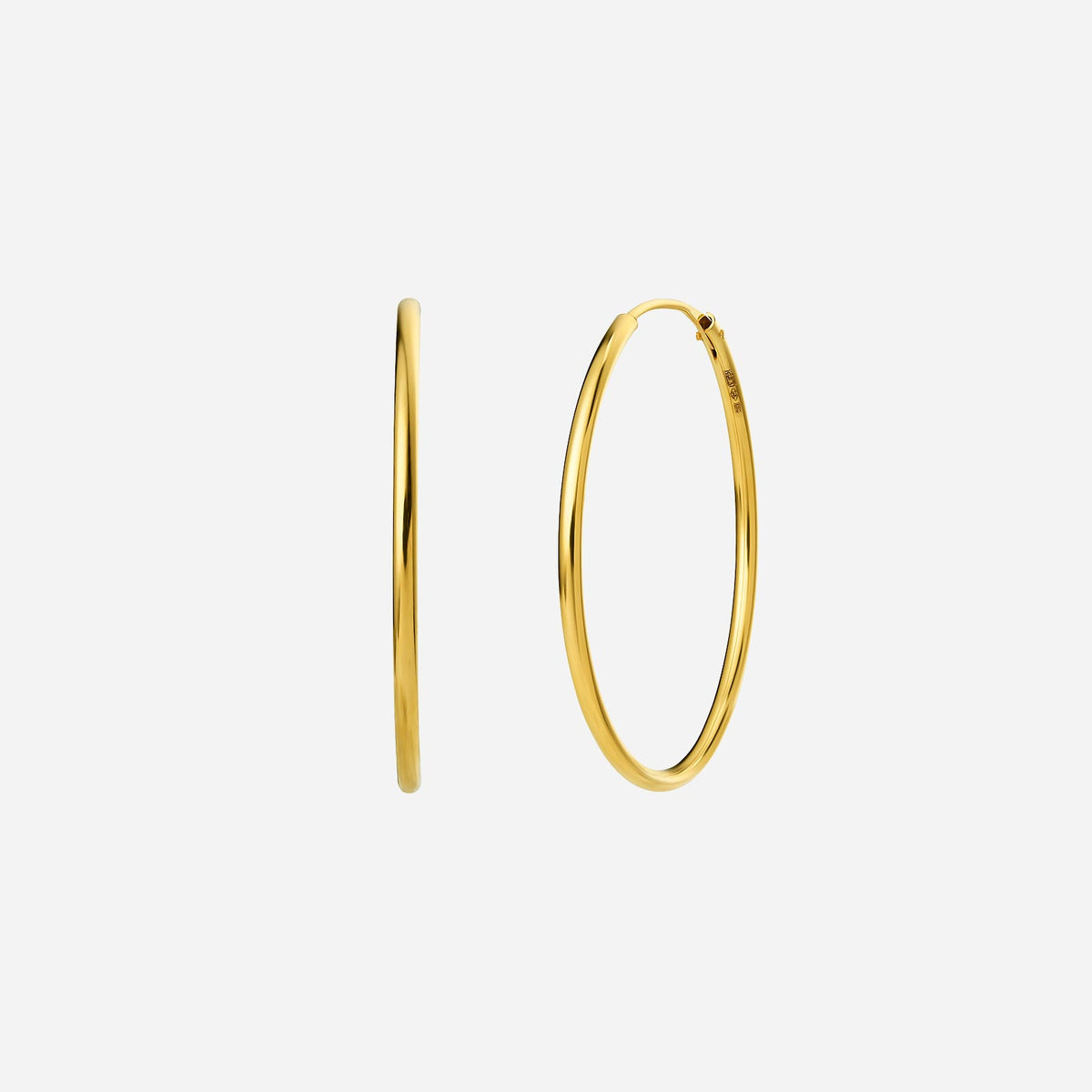 tube hoop earrings in 22k yellow gold, featuring a sleek, modern design for elegant daily wear or special occasions.
