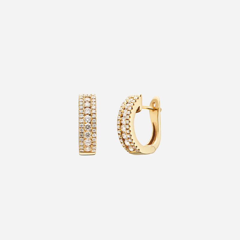 diamond huggie earrings in 18k yellow gold featuring three rows of round brilliant diamonds for added sparkle.