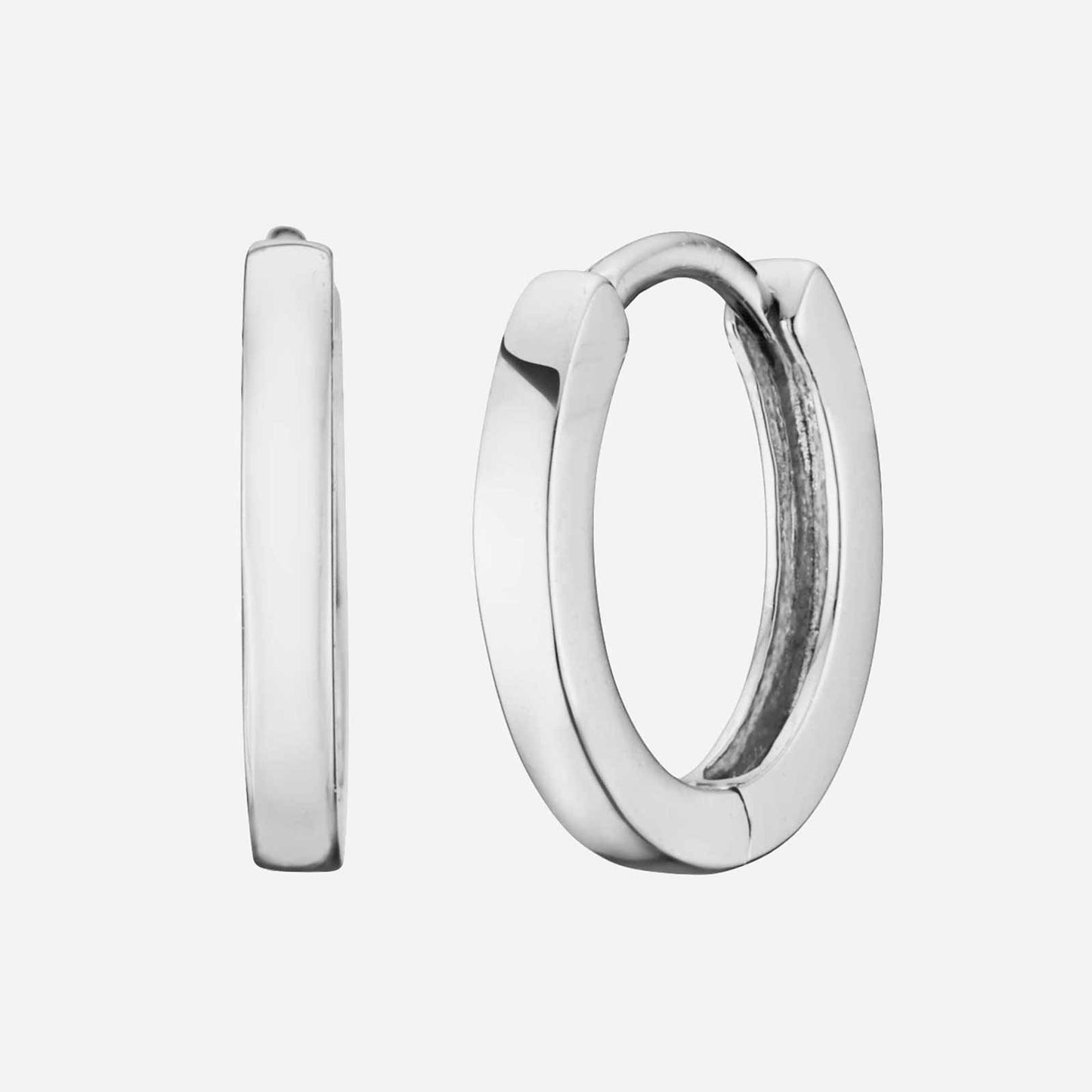 huggie earrings in polished 18k white gold with a sleek, simple design for elegant outfits.