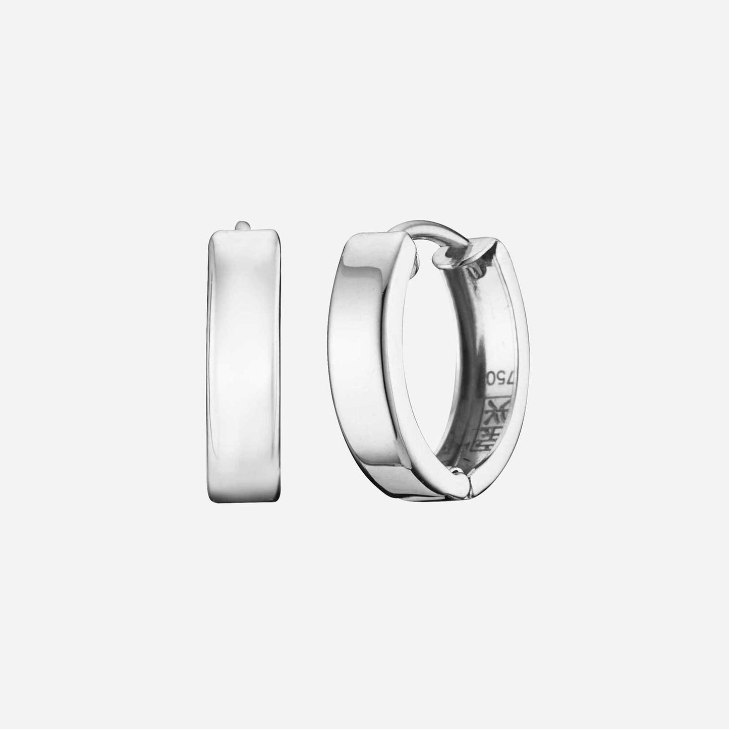 huggie earrings in 18k white gold with a sleek, polished design perfect for adding elegance to any outfit.