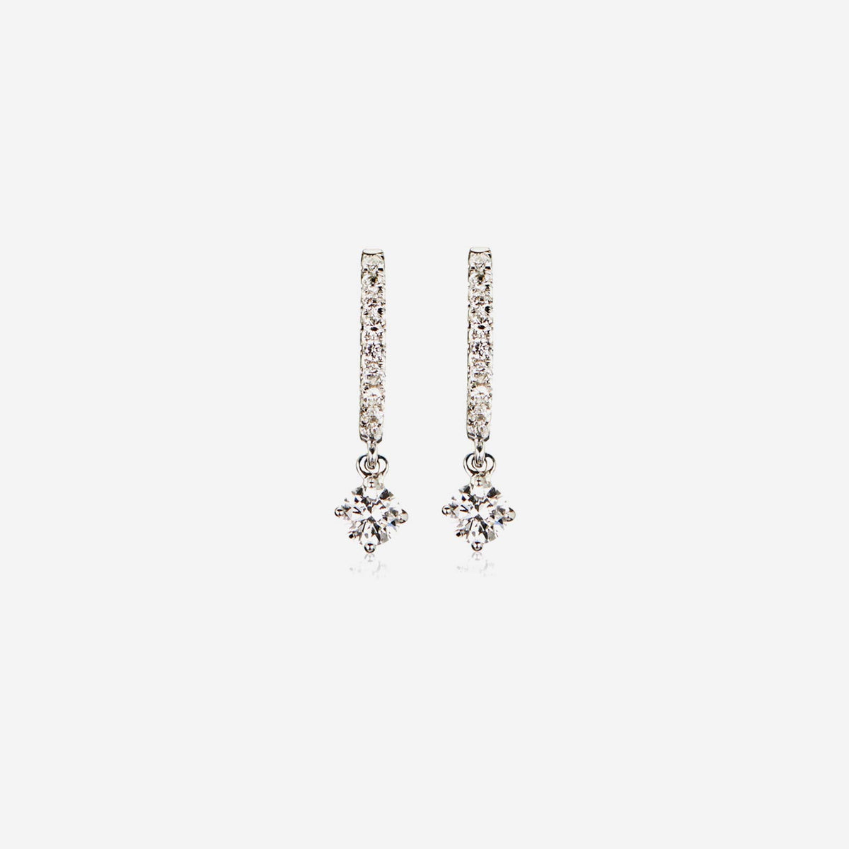 solitaire drop diamond earrings in 18k white gold, featuring a dazzling diamond design for elegant occasions.