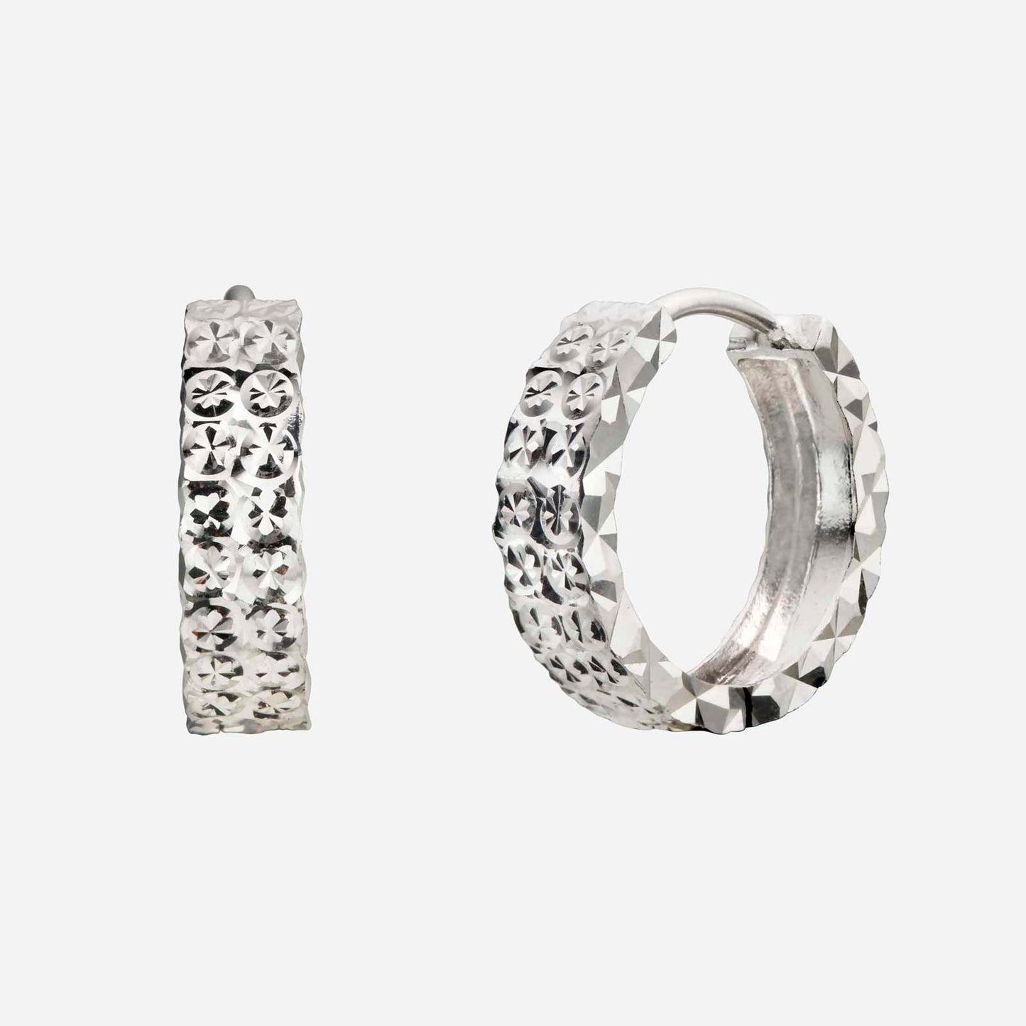 diamond cut hoop earrings in 18k white gold with intricate diamond engravings for a unique shine. perfect gift accessory.