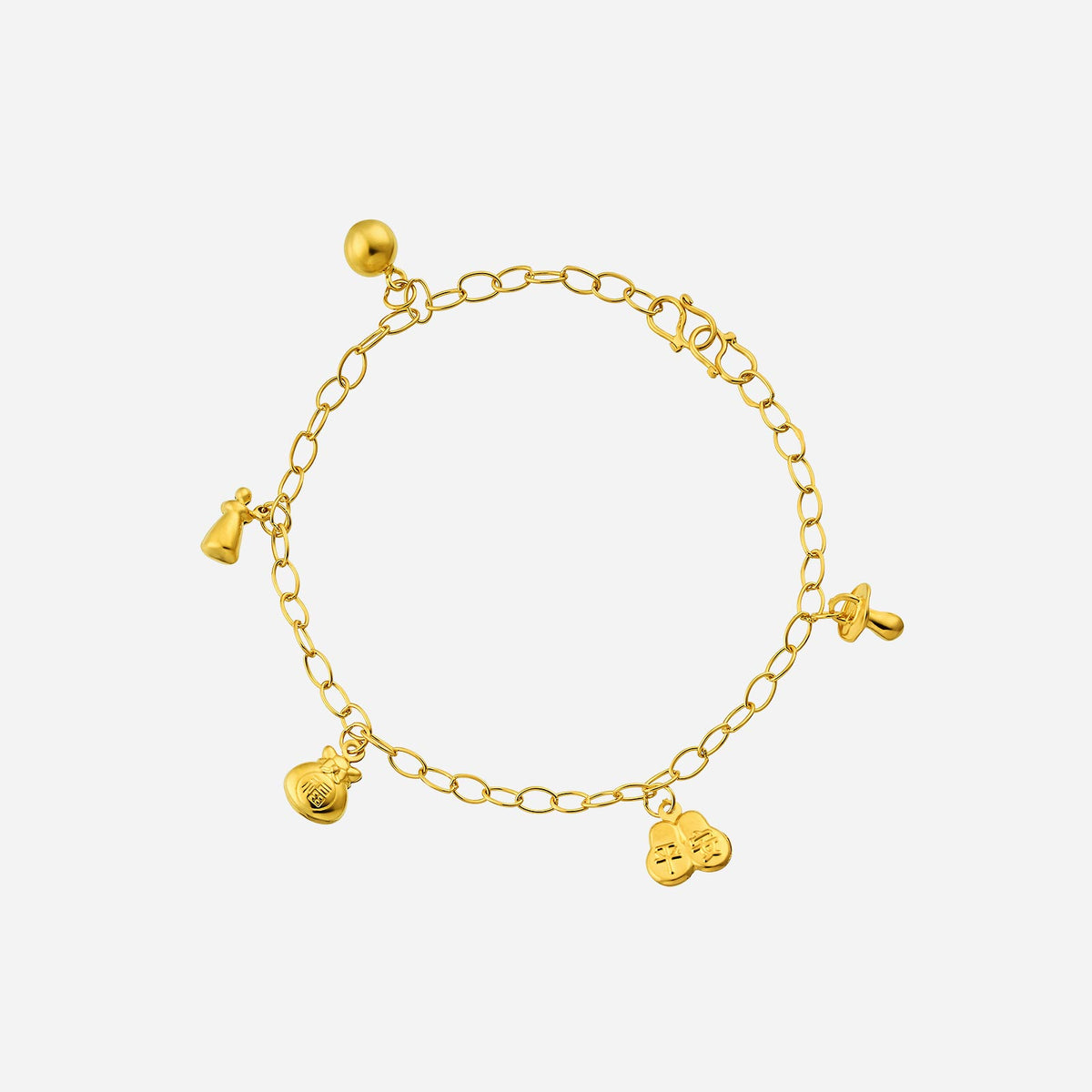 baby charm anklet in 22k yellow gold with charms: shoe, pacifier, milk bottle, bell, and wealth bag.
