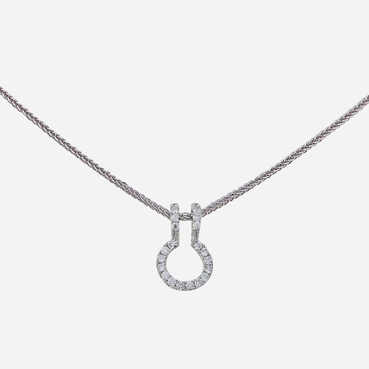 diamond pendant jacket in 18k white gold with sparkling diamonds, featuring a unique circular design.