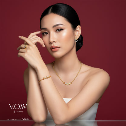 Infinite Love Ring in Yellow and White Gold featuring an intricate infinity design for a timeless elegance.