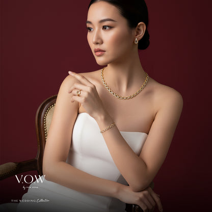 Elegance Omega Ring in 22K Yellow and White Gold, featuring a sleek, flowing design perfect for sophisticated styles.
