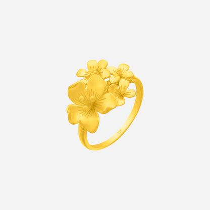 Dreamy Bloom Ring in 22K yellow gold featuring textured floral designs and a prominent arrangement of blossoms.