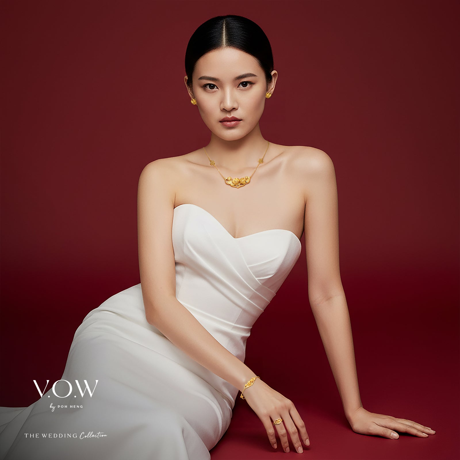 Lotus Harmony Ring in 24K Yellow Gold, featuring twin lotus design, perfect for elegant and traditional occasions.