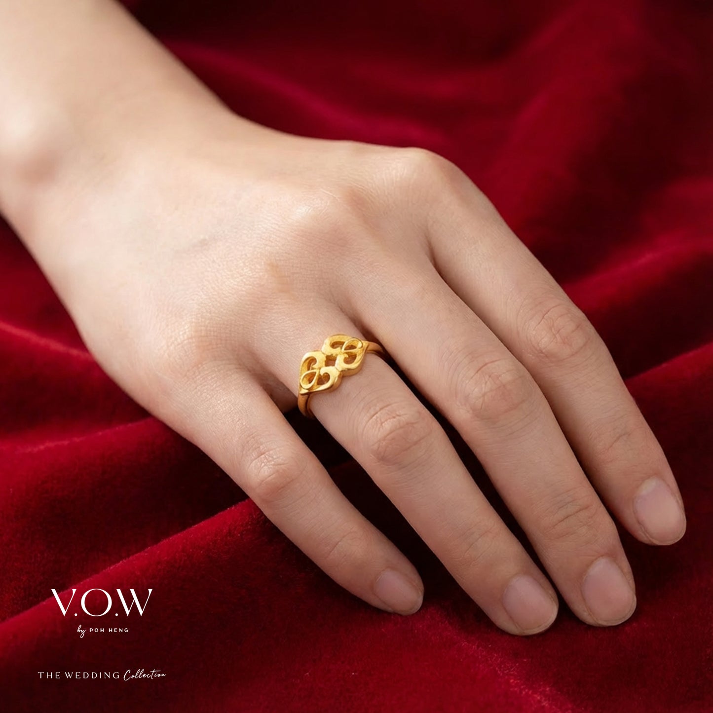 double phoenix ring in 24k yellow gold with a contemporary design symbolizing compassion and trust. perfect for special occasions.