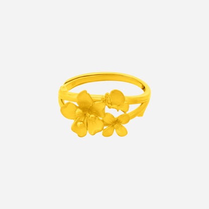 Vibrant Bloom Ring in textured 24K yellow gold featuring cheerful floral designs and varied petal shapes.