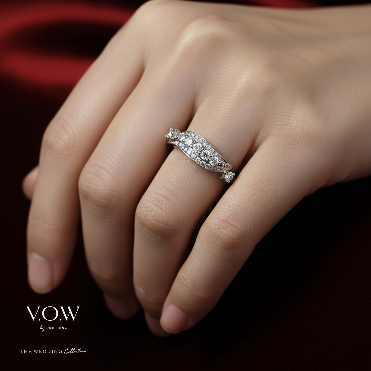 shimmering cascade diamond ring in 18k white gold with brilliant diamonds and elegant wave design.