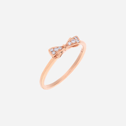 Dulcea Bow Diamond Ring in 18K rose gold with petite diamond bow on a slender band, offering youthful elegance and sparkle.