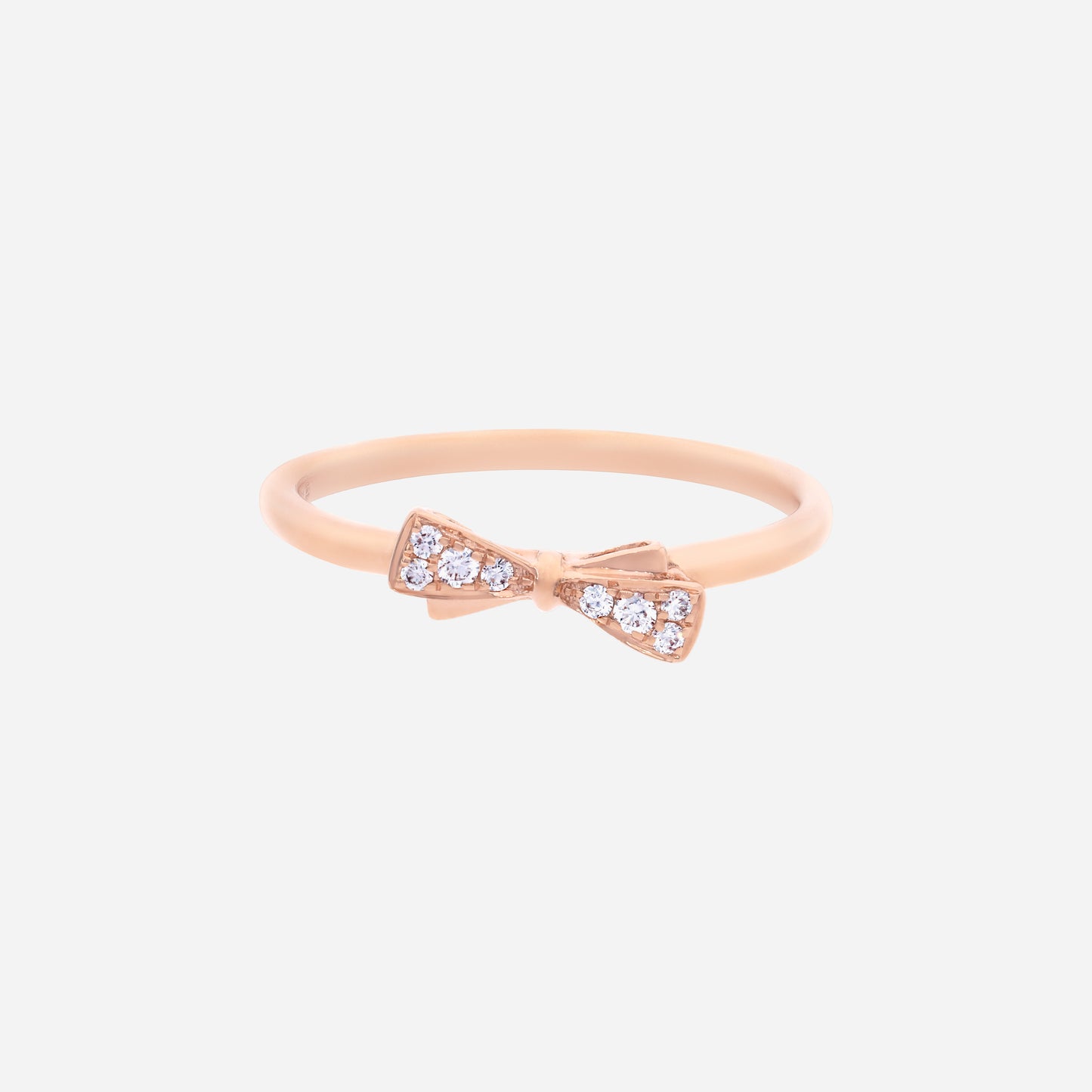 dulcea bow diamond ring in 18k rose gold with a diamond-set bow design, offering a charming and playful sparkle.