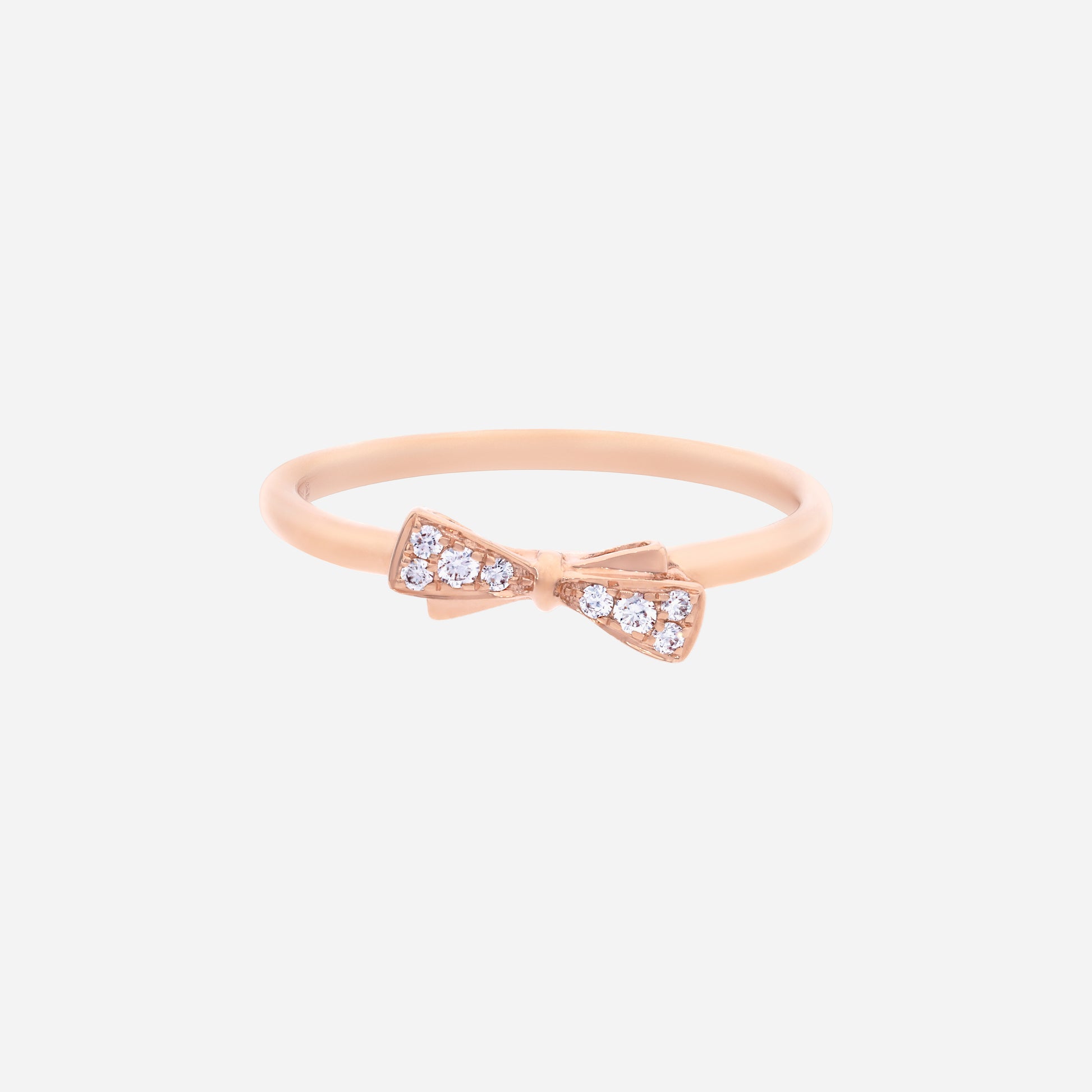 Dulcea Bow Diamond Ring in 18K rose gold with a diamond-set bow design, offering a charming and playful sparkle.