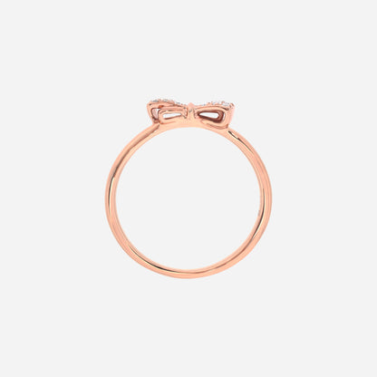 Dulcea Bow Diamond Ring in 18K rose gold with a petite diamond-set bow on a slender band.