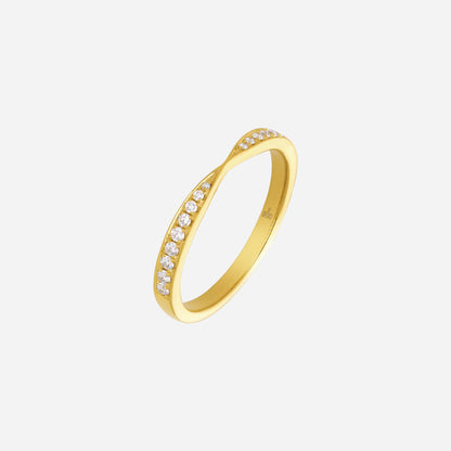 Eternal Spark diamond ring in 18K yellow gold with a graceful crossover design and sparkling diamonds.