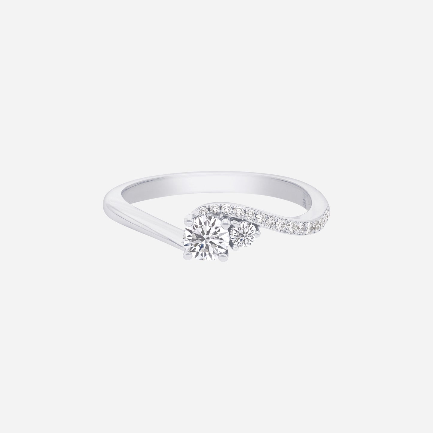 eternal sparkle diamond ring in white gold with a central diamond and pavé-set diamonds along the band.