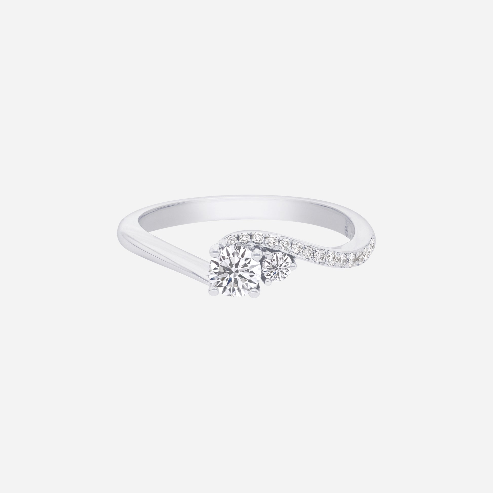 Eternal Sparkle Diamond Ring in white gold with a central diamond and pavé-set diamonds along the band.