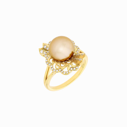 Legacy South Sea Pearl Ring in 18K Yellow Gold featuring a 9–10mm golden pearl and diamond accents in an origami-inspired design.