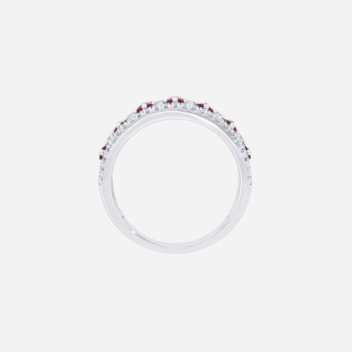 Ruby and diamond ring in 18K white gold, featuring alternating rectangular rubies and diamond accents.