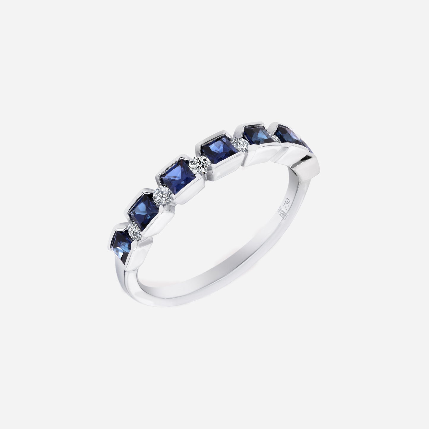 blue sapphire and diamond ring in 18k white gold, featuring square-cut sapphires and delicate diamond accents.