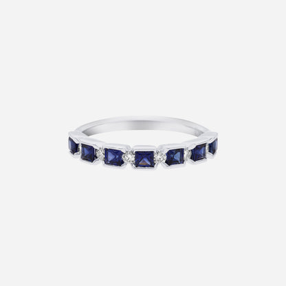 Blue sapphire and diamond ring in 18K white gold with square-cut sapphires and diamond accents.