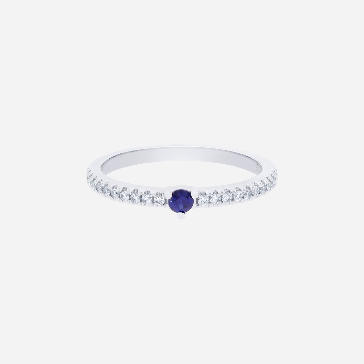 blue sapphire and diamond ring in 18k white gold with a round sapphire center and sparkling diamond accents.