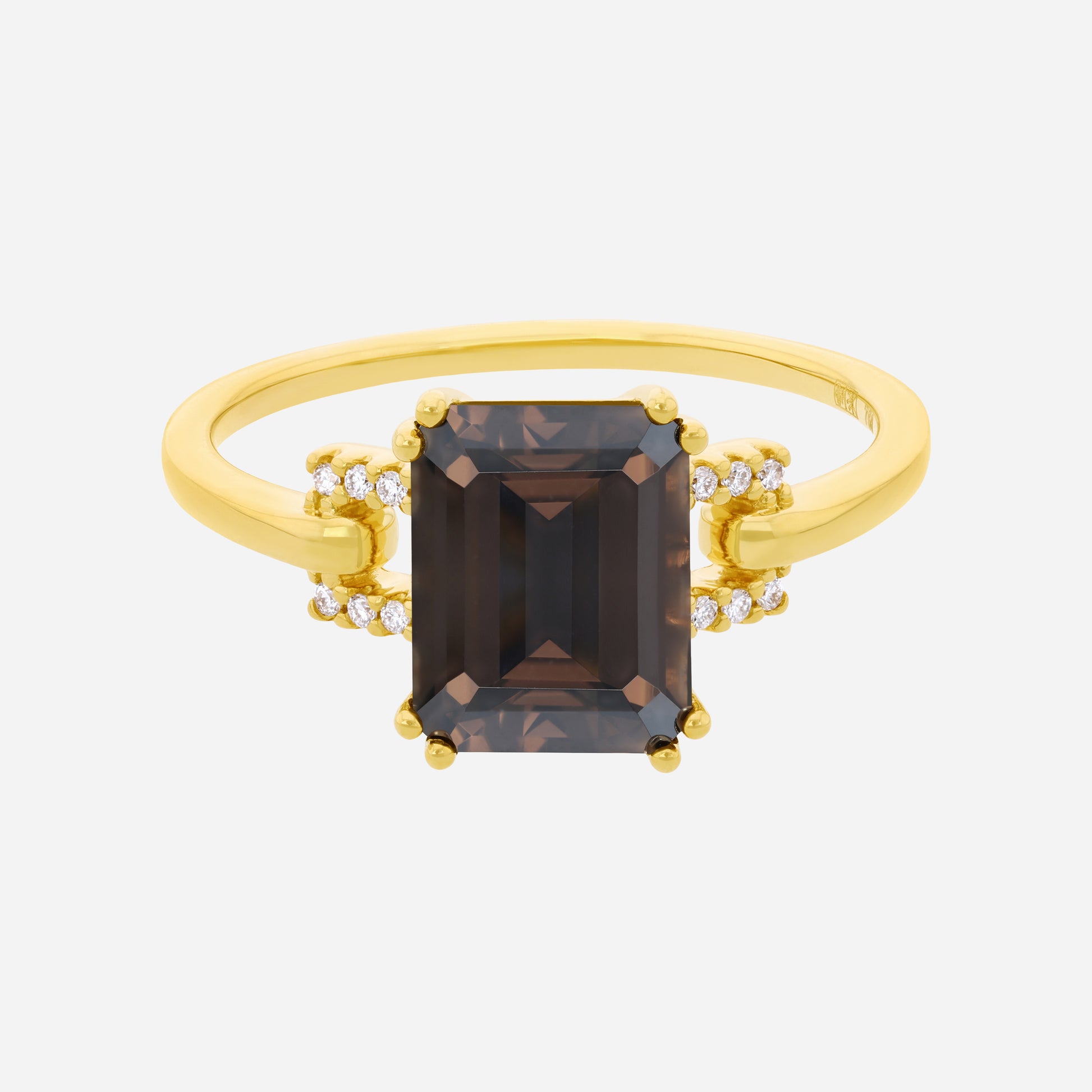 Luxe yellow gold ring featuring an emerald cut smoky quartz gemstone with diamond accents on the band.