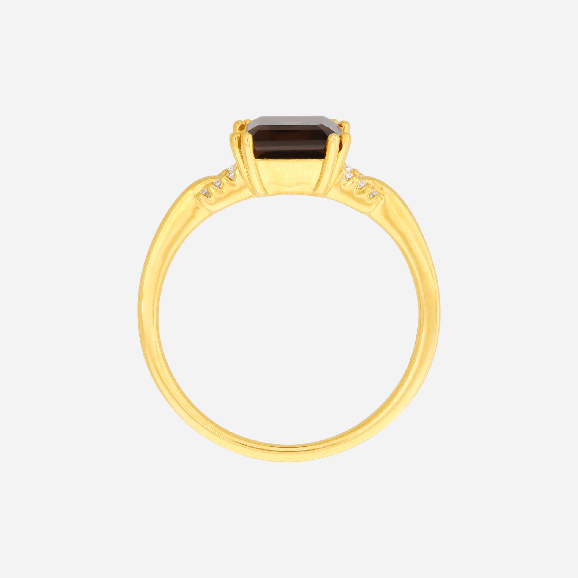 Luxe yellow gold ring featuring an octagonal smoky quartz and accented with small sparkling diamonds.