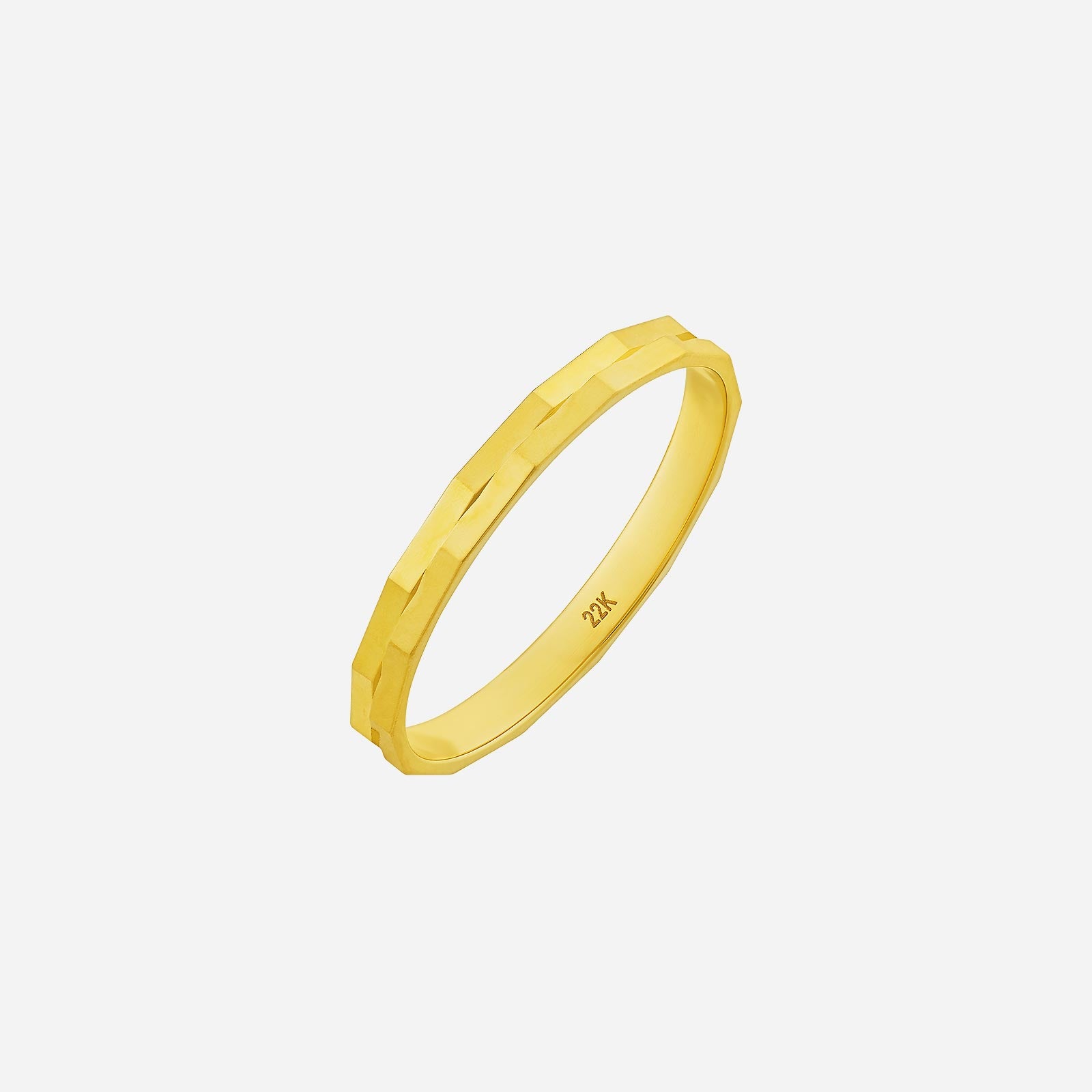 22K yellow gold ring with a faceted design, perfect for stacking or a modern solo look. Elegant and stylish accessory.