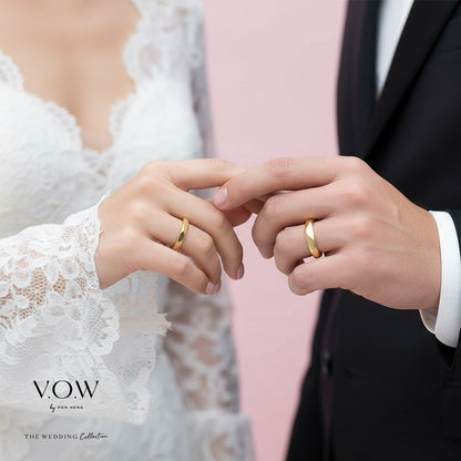 Champagne gold Endless Love Band with elegant design worn on bride and groom's hands celebrating love.