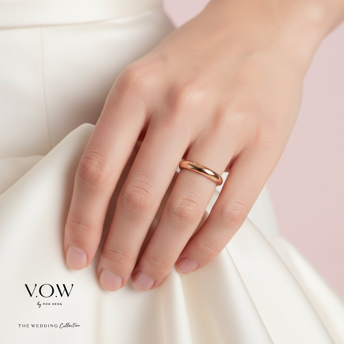 18k rose gold infinite love band with a smooth, curved surface, showcased on a hand. perfect for elegant styling.