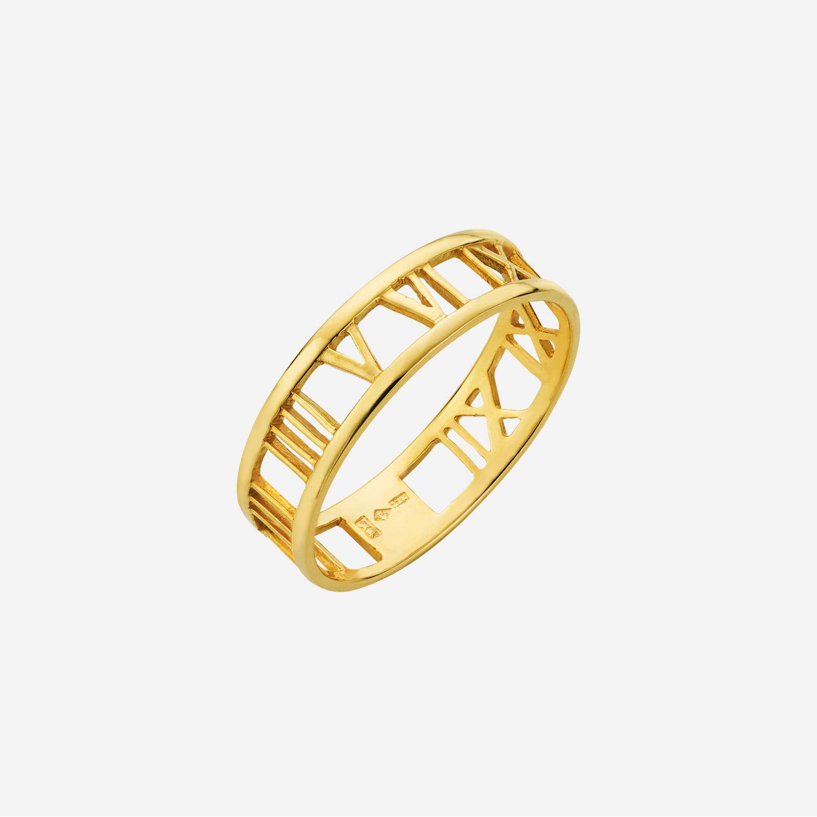 Classic 22K yellow gold Roman numeral ring with intricate motifs, featuring a polished finish and elegant design.