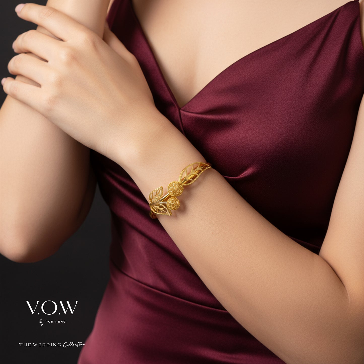 22k yellow gold bangle featuring intricate leaf motifs and floral designs, perfect for weddings and special occasions.