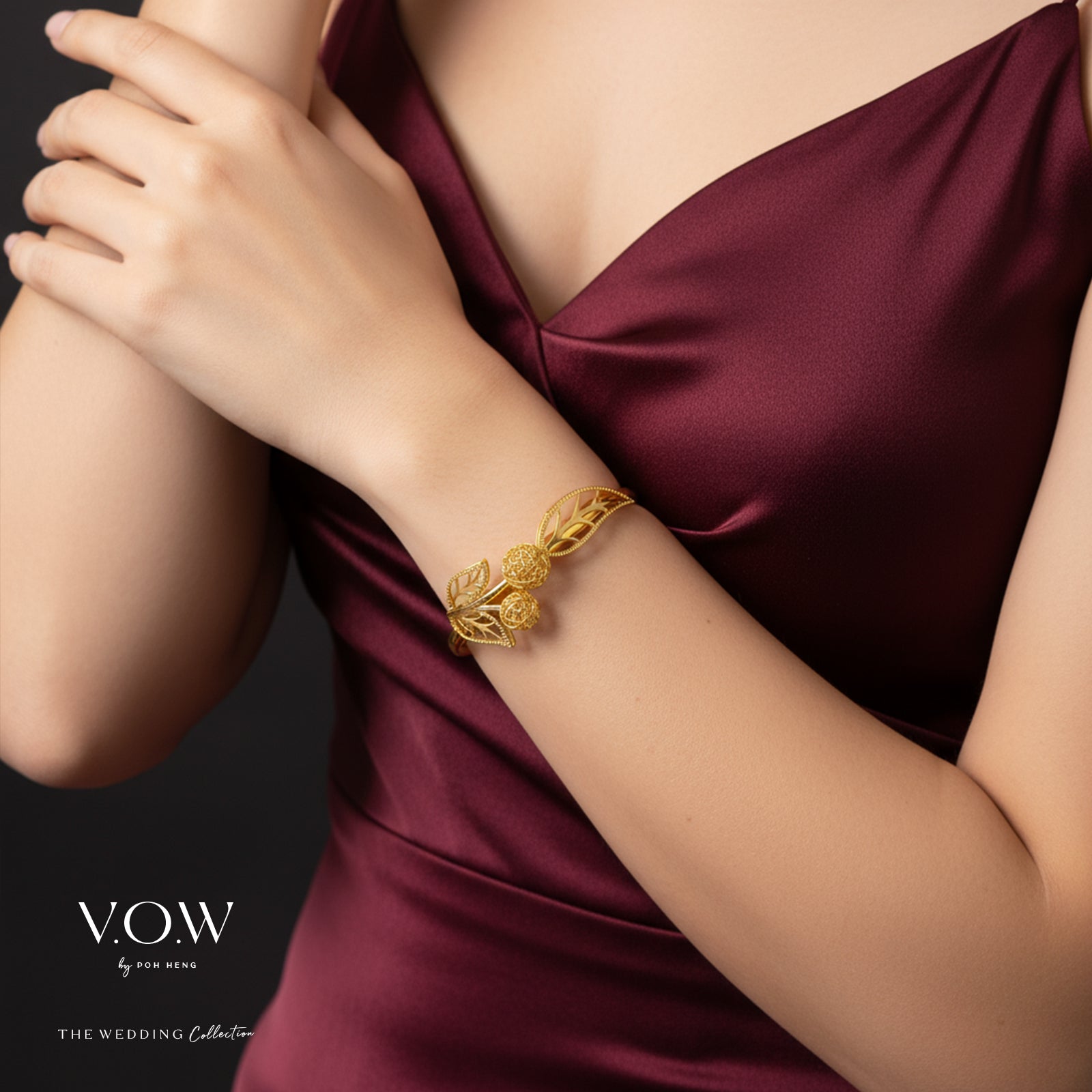 22K yellow gold bangle featuring intricate leaf motifs and floral designs, perfect for weddings and special occasions.