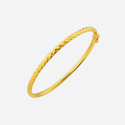 22K yellow gold bangle with a textured surface, perfect for layering or wearing alone for an elegant statement.