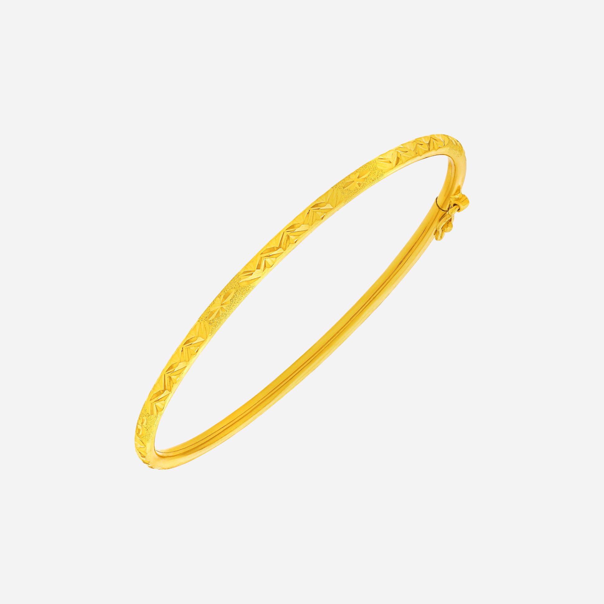 Crafted Twinkle Bangle in 22K Yellow Gold with delicate light-catching details and a sleek band design.