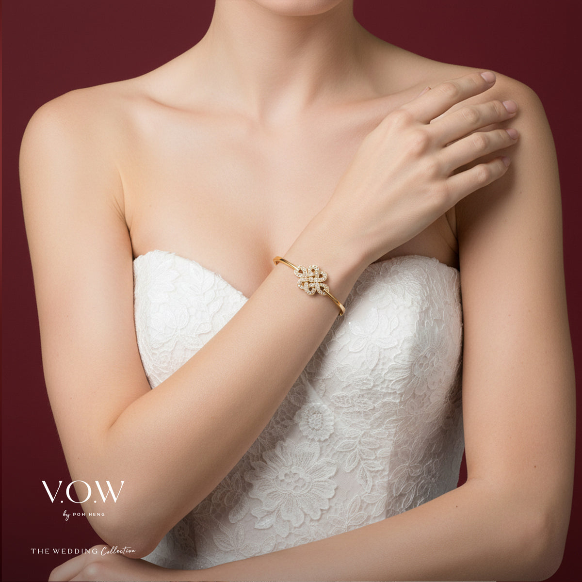 Eternity Knot bangle in 18K yellow gold featuring a diamond-adorned design, symbolizing eternal love and wisdom.
