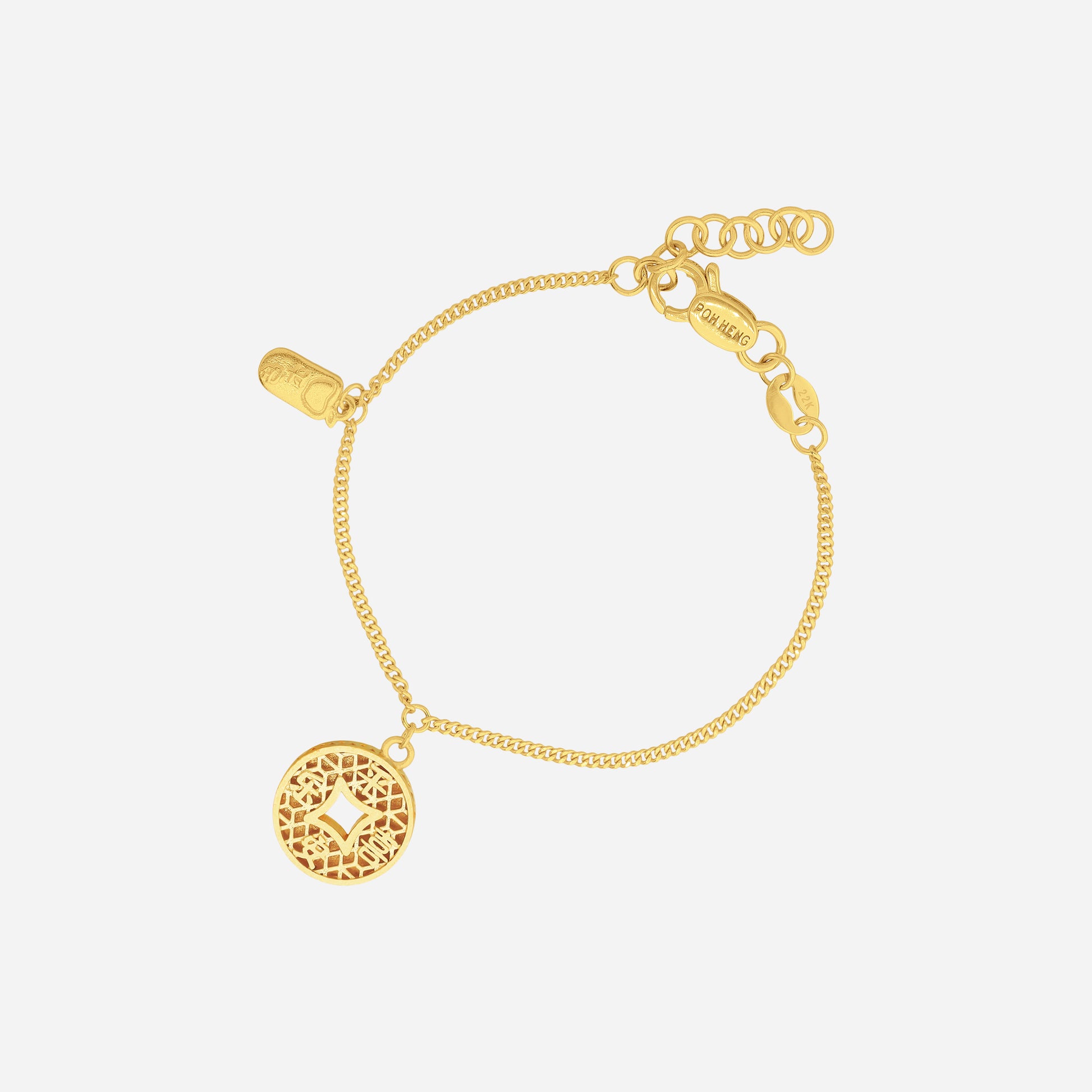 Joyful Baby Bracelet in 22K yellow gold with fine chain and small auspicious charms for little wrists.