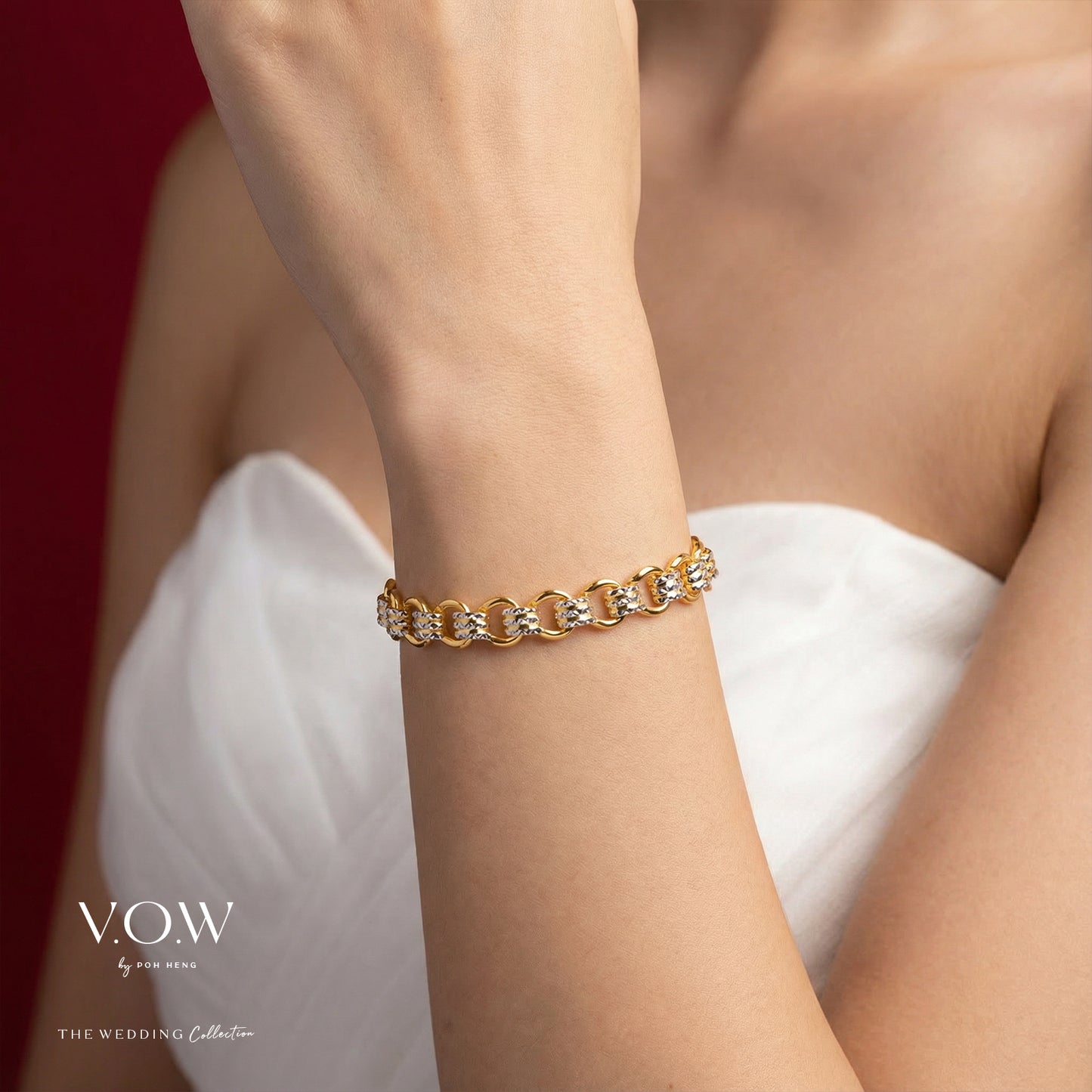 elegance torus bracelet in yellow and white gold with interlocking links and sparkling gemstones. perfect for weddings.