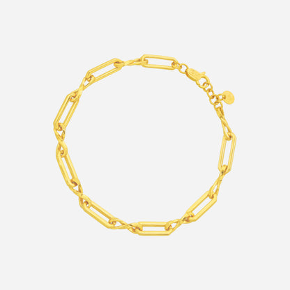 Interlock Twist Bracelet in polished 22K yellow gold with elongated rectangular links and twist connections.