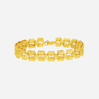 Glistening heart bracelet crafted in 22K yellow gold with a seamless design and bold sparkle.