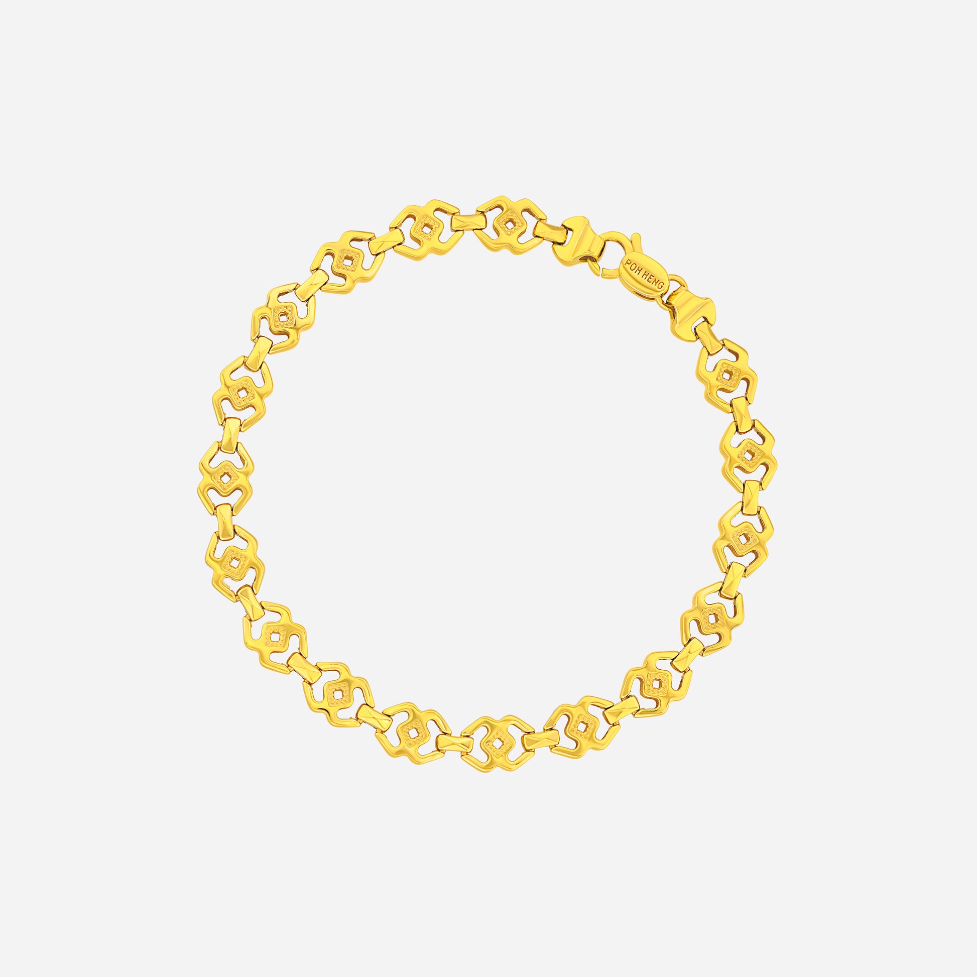 Geometric Link Bracelet in 22K yellow gold with chunky oval links and rope-style detailing.