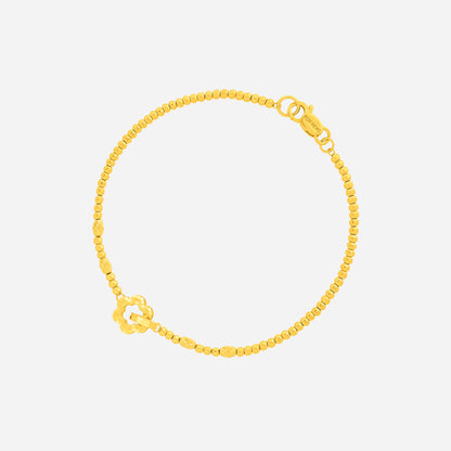 Bloom Link Bracelet in 22K Yellow Gold with open floral centerpiece and polished bead accents for elegance.