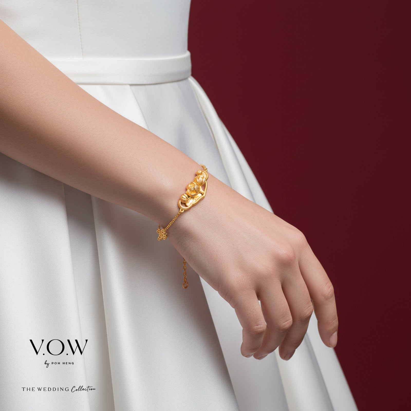 Lotus Harmony Bracelet in 24K yellow gold with intricate twin lotus design and adjustable chain clasp.
