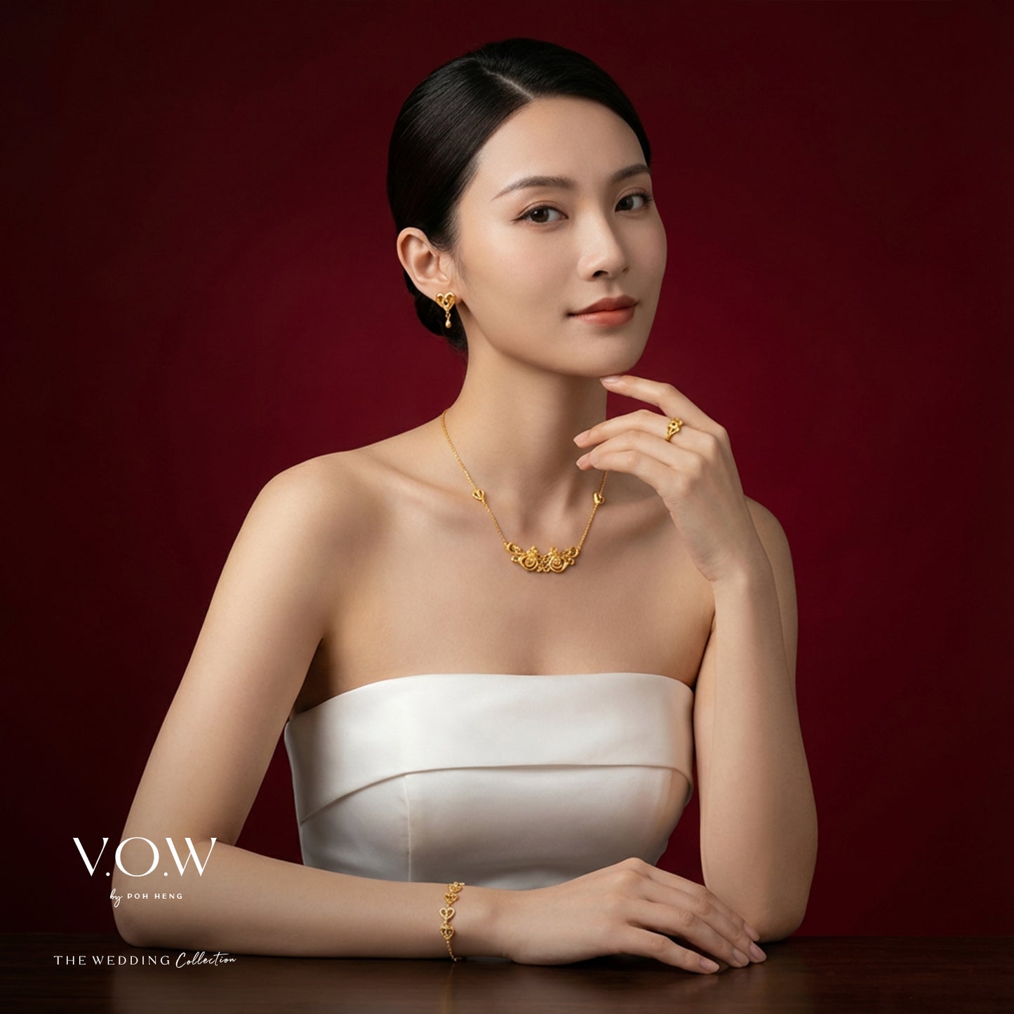 double phoenix bracelet in 24k yellow gold featuring a delicate, elegant design representing happiness and blessings.