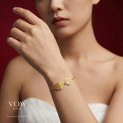 Minimalist yellow gold charm bracelet with dragon and phoenix motifs, perfect for weddings and daily wear.